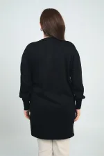 Tunique en maille grande taille pour femme, avec une poche avant et un imprimé pierre.