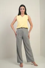 Pantalon palazzo pour femme avec taille élastiquée, poches et détails plissés