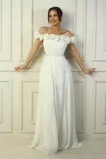 Robe longue en mousseline pour femme, ornée d'un décolleté floral découpé au laser, doublée et ceinturée à la taille.