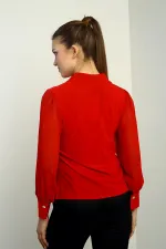 Chemise à manches longues en mousseline boutonnée sur le devant pour femme