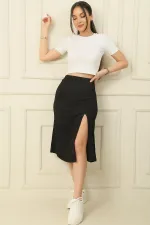 Jupe longue gaufrée à taille élastiquée et fente sur le devant