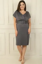 Front and back V-neck, belted waist, lined plus-size dress.