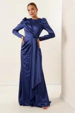Long-sleeved satin dress with pleat detail at the front and lining.