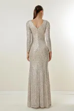 Robe longue à sequins doublée, décolleté cache-cœur et drapé sur le devant
