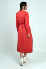 Gilet long pour femme avec manches boutonnées, poches et fentes latérales