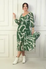 Robe portefeuille en mousseline à encolure Madonna, doublée, à nœuds croisés et motif abstrait