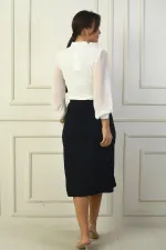 Jupe à taille élastique avec fente sur le devant sous le genou