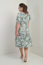 Kadın V Yaka Karışık Yaprak Desenli Cepli Eteği Fırfırlı Büyük Beden Elbise