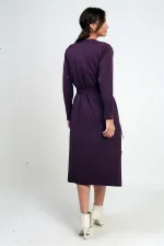 Gilet long pour femme avec manches boutonnées, poches et fentes latérales