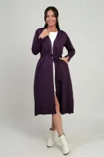 Gilet long pour femme avec manches boutonnées, poches et fentes latérales