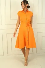 Button-front, belted, pocketed linen-effect dress.