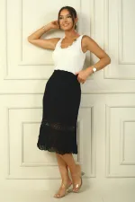 Jupe en mousseline de soie à taille élastique et dentelle