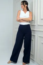 Pantalon en tricot à jambes larges et fermeture éclair latérale pour femme