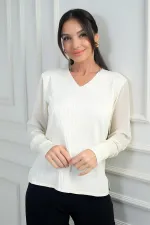 Pull sans manches en mousseline à col en V pour femme