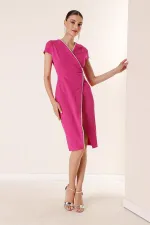 Wrap-neck, half-moon sleeve dress with stone details and front slit.
