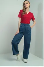 Jean à jambes larges pour femme avec taille élastique et poches latérales à scratch