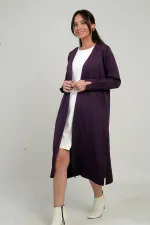 Gilet long pour femme avec manches boutonnées, poches et fentes latérales