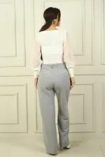 Pantalon Palazzo à rayures longitudinales et poches latérales pour femme