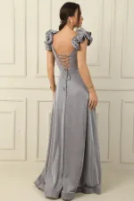 Robe longue drapée à manches volantées et doublure scintillante