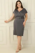 Front and back V-neck, belted waist, lined plus-size dress.