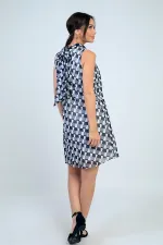 Robe courte en mousseline doublée à motifs et col en V pour femme