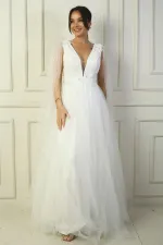 Robe de soirée longue en tulle pour femme, décolleté en V devant et dos, ornée de perles et à taille large.