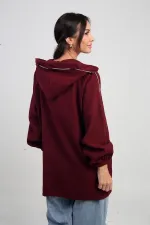 Gilet en cachemire à capuche pour femme avec poche kangourou zippée et détails en corde brillante