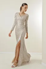 Robe longue à sequins doublée, décolleté cache-cœur et drapé sur le devant