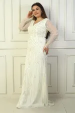 Robe longue grande taille à décolleté en V devant et dos, manches en tulle, doublée et ornée