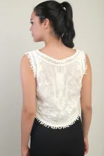 Chemisier festonné brodé à paillettes et perles pour femme