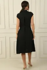 Button-front, belted, pocketed linen-effect dress.