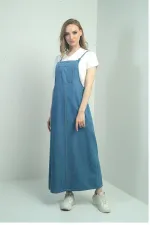 Gilet long en jean à fines bretelles pour femme avec poches avant Gilet long en jean à fines bretelles pour femme avec poches avant