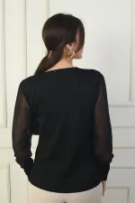 Pull sans manches en mousseline à col en V pour femme