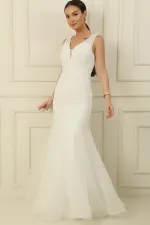 Robe sirène longue à paillettes, doublée, ornée de sequins et de perles, avec un dos nu et des sequins scintillants.