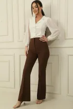 Pantalon taille haute à pattes d'éléphant en lycra avec poches