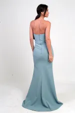 Robe longue en crêpe à doublure ornée de pierres et drapée sur le devant