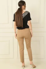 Pantalon à double poche et taille élastique