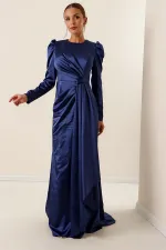 Long-sleeved satin dress with pleat detail at the front and lining.