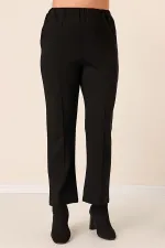 Pantalon grande taille avec taille élastique, poches latérales et tissu Lycra