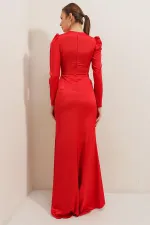 Long-sleeved satin dress with pleat detail at the front and lining.