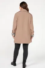 PLUS SIZE BONDIT TRENCH COAT WITH LINED, ZIPPED POCKETS AND SCARF ACCESSORY.