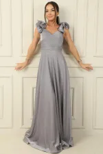 Robe longue drapée à manches volantées et doublure scintillante