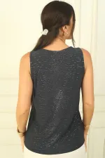 Blouse à col en V froncée sur le devant en lycra pailleté