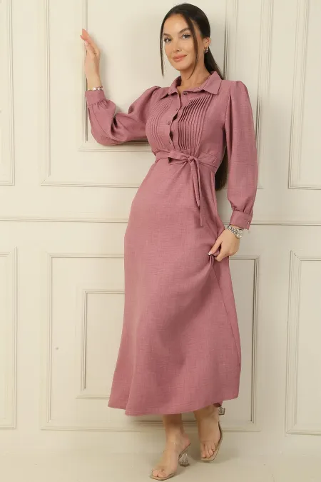 Long dress with half-button front, ribbed detail, and belted waist.