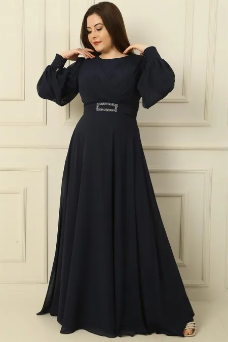 Wrap-neck, belted, lined, plus-size long modest dress.