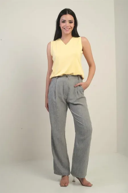 Pantalon palazzo pour femme avec taille élastiquée, poches et détails plissés