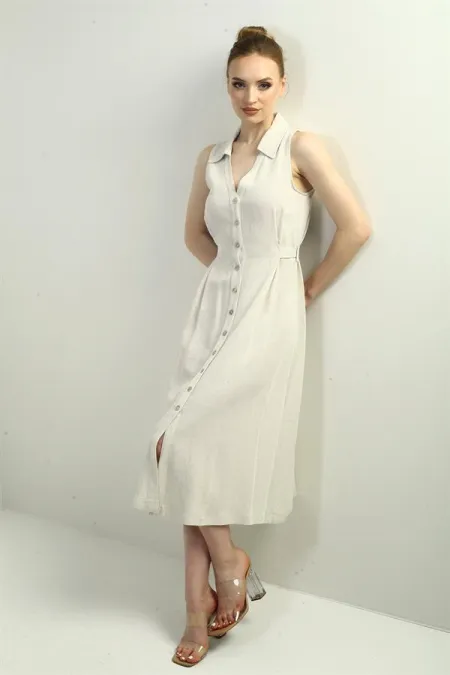 Robe midi en lin à col polo pour femme, ornée d'un pli sur le devant et de boutons.