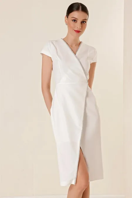 Wrap-neck, half-moon sleeve dress with stone details and front slit.