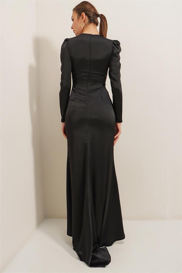 Long-sleeved satin dress with pleat detail at the front and lining.