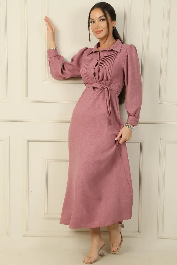 Long dress with half-button front, ribbed detail, and belted waist.
